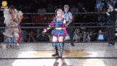 a woman in a wrestling ring with the word hawaii on the bottom