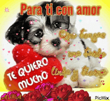 a puppy holding a red heart that says te quiero mucho on it