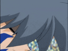 a close up of a cartoon character 's face with a blue stripe on it