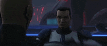 a man in a clone trooper uniform is standing next to another man in a dark room .