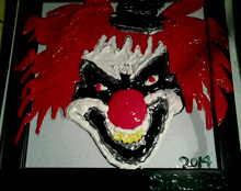 a painting of a scary clown with the year 2014 on it