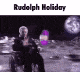 a man in a wheelchair is standing on the moon holding a purple object .