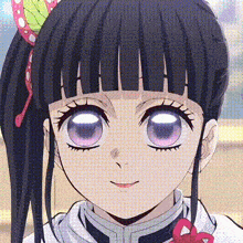 a close up of a girl 's face with a butterfly in her hair