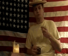 put cigarette cigarette in mouth about to smoke will smoke usa flag