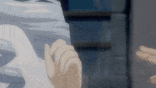 a close up of a person 's hand holding another hand