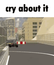 a picture of a race car on a track with the words cry about it above it