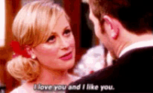 a man and a woman are looking at each other and the woman is saying i love you and i like you