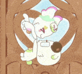 a couple of cartoon characters laying on top of each other in a heart shaped window .