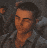 a close up of a man 's face with a smile