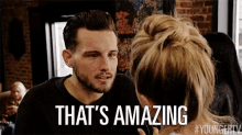 a man and a woman are looking at each other with the words that 's amazing on the bottom