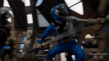 Punching Ollie Akana GIF - Punching Ollie Akana Blue Dino Fury Ranger GIFs