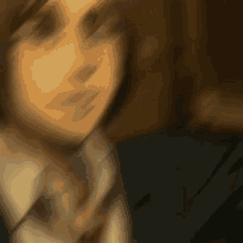 a blurry image of a man in a suit and tie