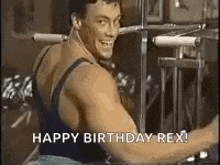 a man is lifting weights in a gym and smiling while saying `` happy birthday rex '' .