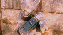 a person is carrying a stack of boxes that say ' a ' on them
