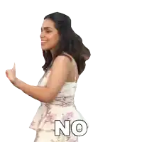 a woman in a floral dress has the word no on her back