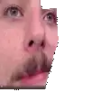 a pixelated image of a man 's face with a beard