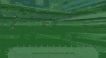 a soccer player is running towards the ball in a stadium