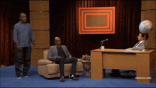 a man standing next to a man sitting in a chair with the words adult swim on the bottom right
