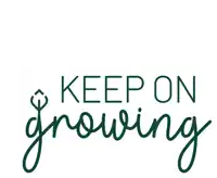 a sign that says " keep on growing " with a plant in the background