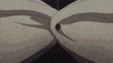 a close up of a person 's chest with a button
