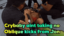 a man laying on the ground with the words crybaby aint taking no oblique kicks from jon