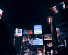 a billboard with a cat on it and the word yakult
