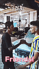 two men shaking hands in front of a car with the words friends written on the bottom