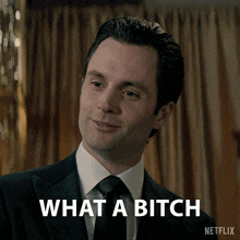 a man in a suit and tie says " what a bitch " in a netflix ad