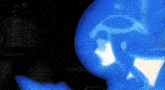 a blue light is shining on a person 's head .