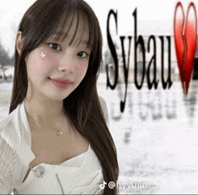 a picture of a woman with sybau written on the background