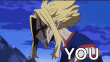 all might from my hero academia is standing in front of a mountain with the words `` you '' written on his face .