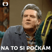 a man with a yellow ladder behind him and the words na to si pockam