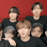 a group of young men are posing for a picture together .