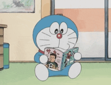 doraemon is sitting on the floor reading a magazine .