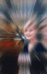 a blurry picture of a person 's face with a blue light coming out of the center