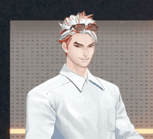 a man wearing sunglasses and a white shirt smiles