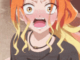 a close up of a girl 's face with her mouth wide open