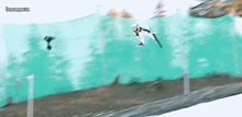 a ski jumper is flying through the air with lewanarta written above him