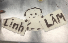 the word linh is written on a piece of paper