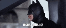 a man in a batman costume says " jesus louisus "