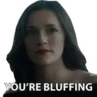 a woman with a sticker that says you 're bluffing on it
