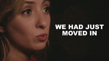 a woman says we had just moved in in a dark room