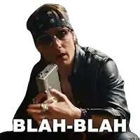 a man wearing sunglasses and a bandana is holding a blah-blah sticker