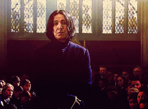 Severus Snape fom Harry Potter opens his hands wide and shrugs as if to say "I don't know, dude!"