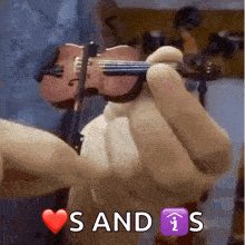 a person is holding a small violin with the words s and i s written below it