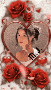 a picture of a woman in a heart shaped frame with the name m.j. on it