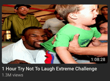 a picture of a man holding a child with the caption " 1 hour try not to laugh extreme challenge "