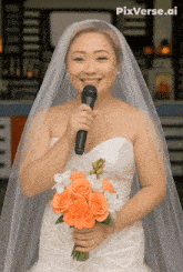 a woman in a wedding dress is holding a microphone and a bouquet of orange roses
