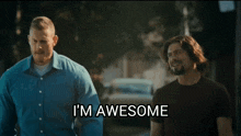two men standing next to each other and one of them says i 'm awesome
