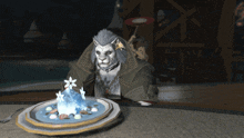 a lion sitting next to a plate of food